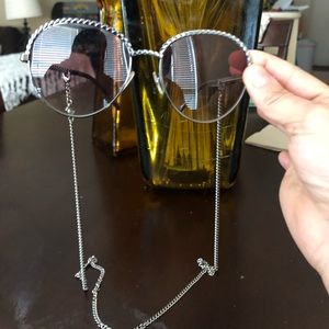 Chanel sunglasses with chain.